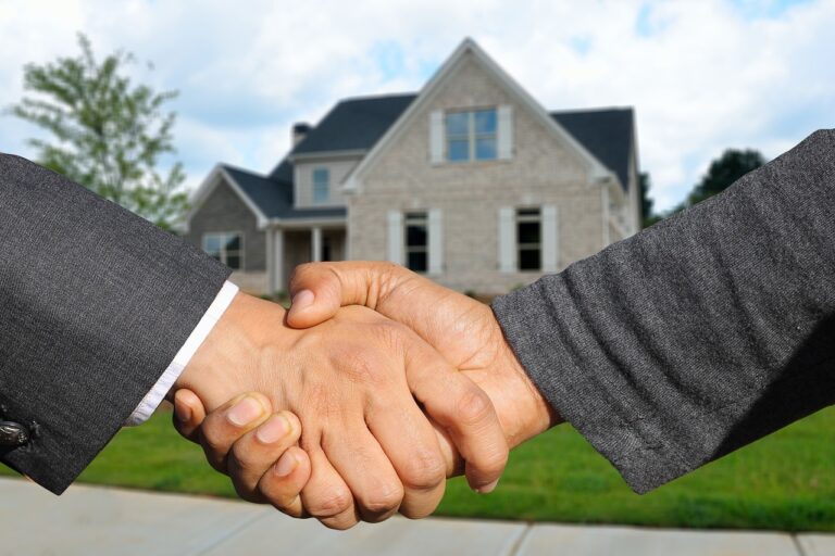 Newly constructed suburban house with brick and stone exterior, ideal for property transactions using Purpose Codes for CHAPS Payments.