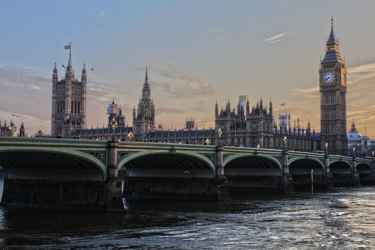 Houses of Parliament in London representing new UK immigration policies, including the safe country rule.