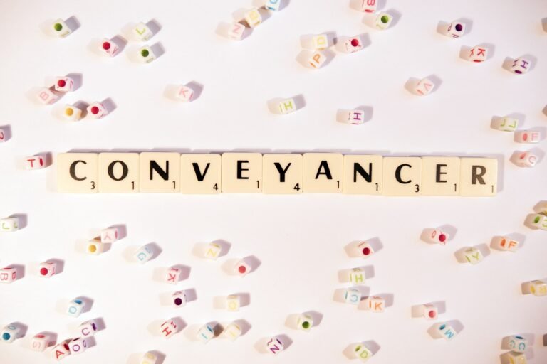 QES conveyancing concept with conveyancer word in scrabble tiles