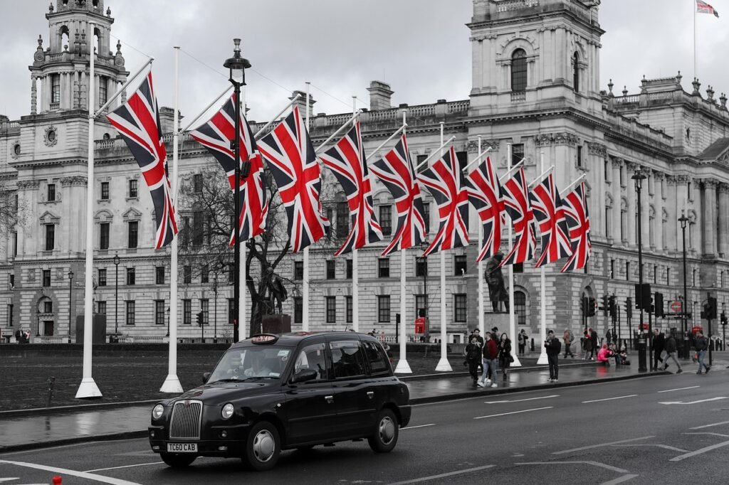 Union Jack flags wave across Whitehall, and therefore they highlight national pride while the Proposed Changes to ILR Route shape immigration policy.