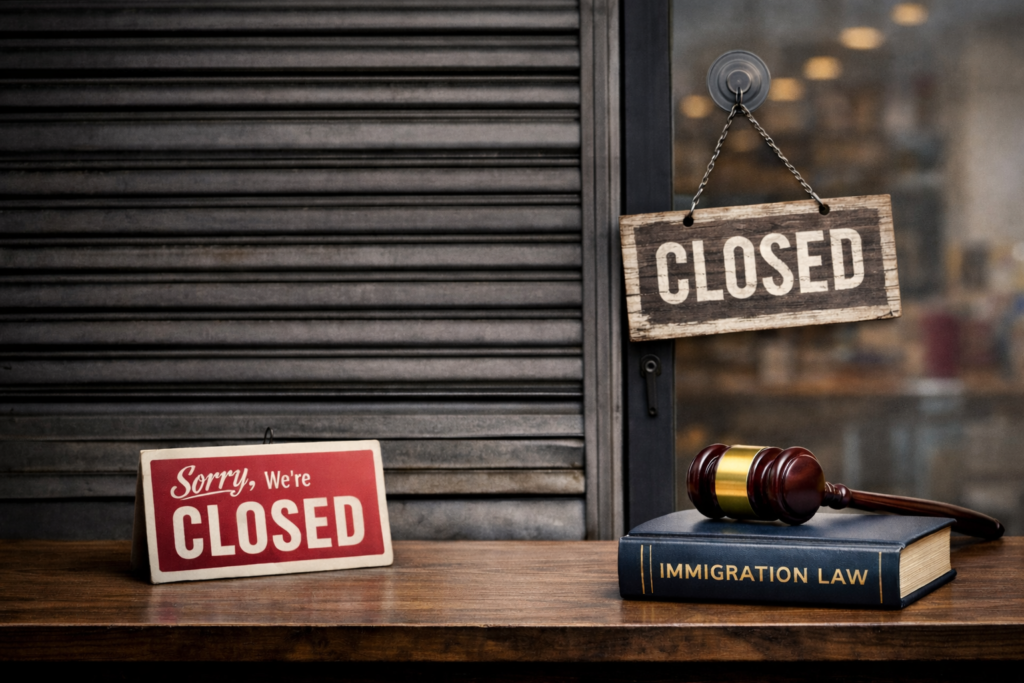 Closed retail storefront symbolising UK employer sponsorship restrictions impacting small businesses.